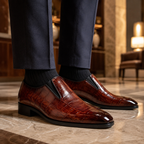 Sevilla Croc-Embossed Loafer in cognac, worn