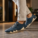 Riviera Hand-Stitched Leather Sneaker in blue, worn