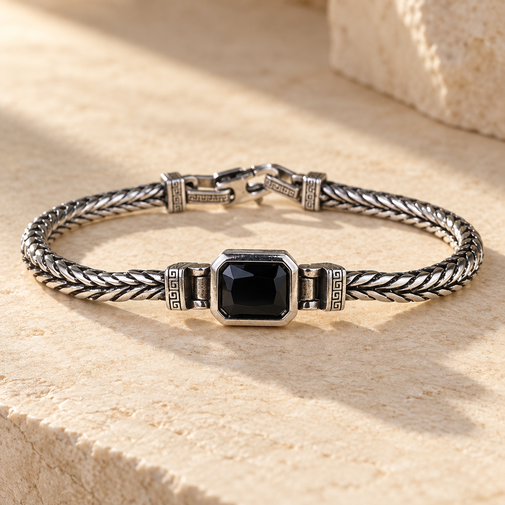 Onyx Gemstone Bracelet — full bracelet on limestone