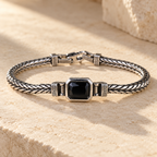Onyx Gemstone Bracelet — full bracelet on limestone