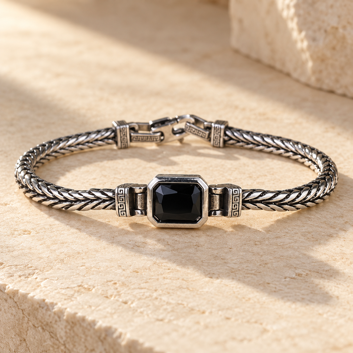 Onyx Gemstone Bracelet — full bracelet on limestone