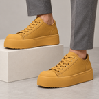 Torino Retro Leather Sneakers — Brown — worn view